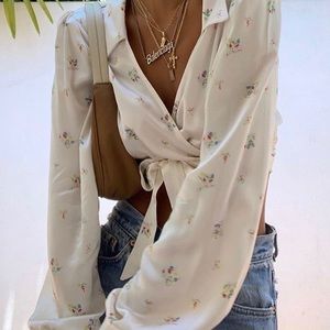 The rosemilk in my arms again silk wrap blouse